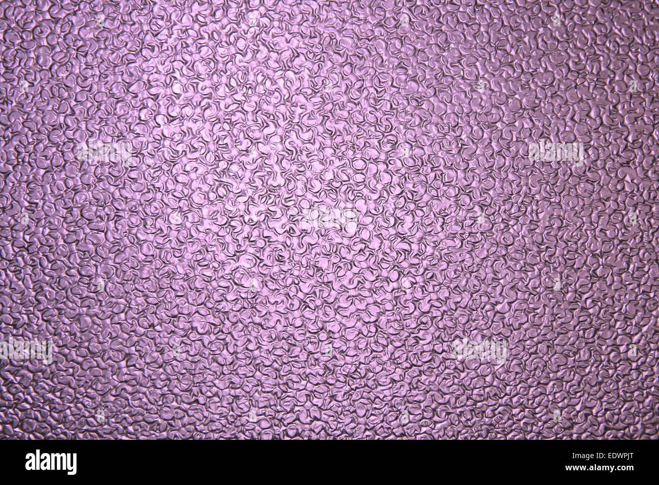 Modèle de bloc de verre rose clair transparent surface texture mur dans la salle de bains, Close up Banque D'Images