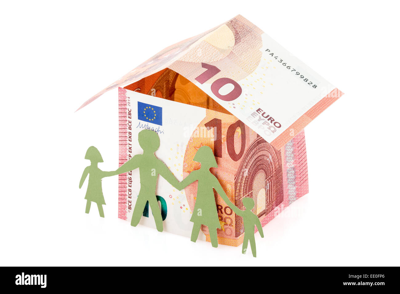 La famille et leur maison en euro banknotes Banque D'Images