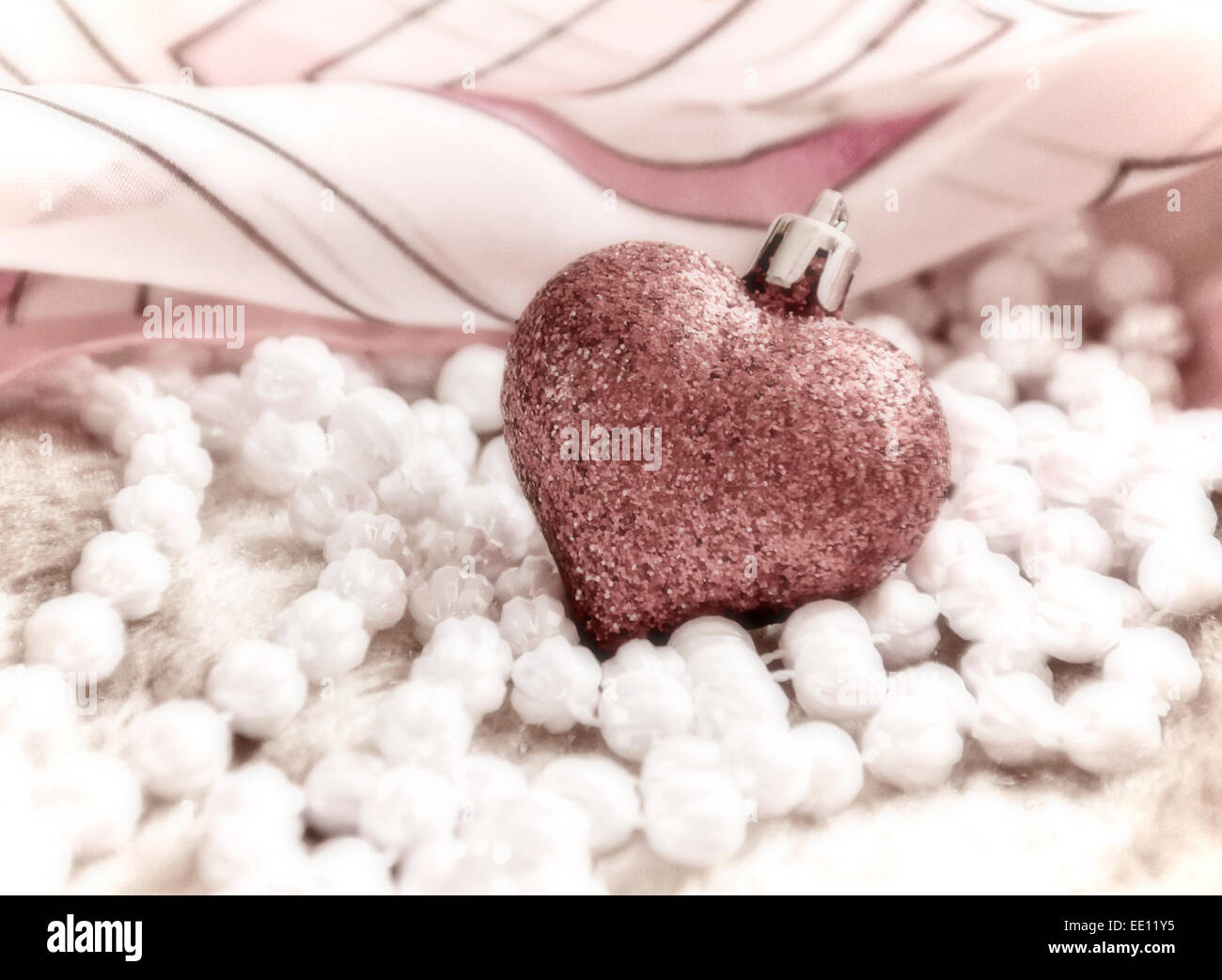 Coeur de verre et de perles, de l'amour artificiel Banque D'Images