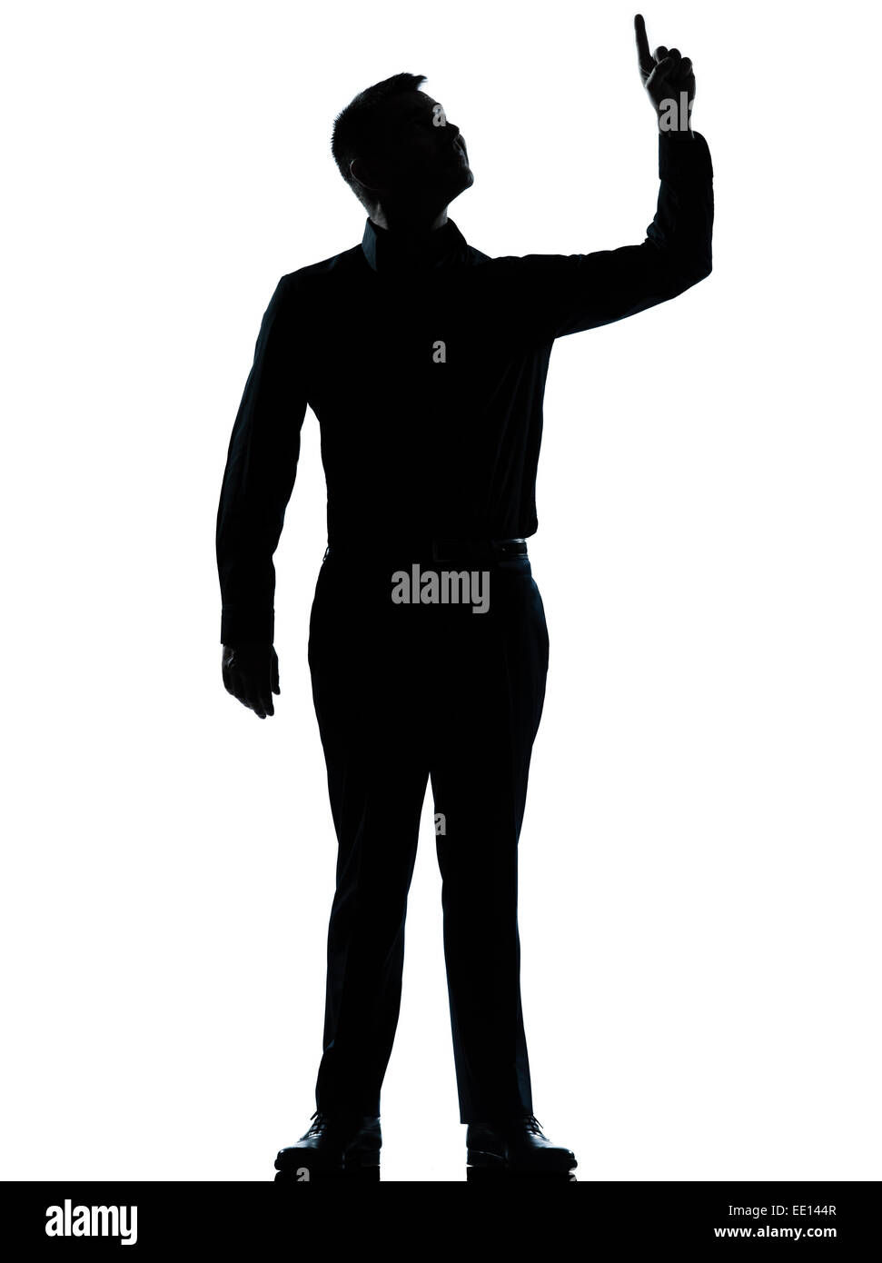 Un homme d'affaires caucasiennes jusqu'poiting heureux silhouette debout toute la longueur en studio isolé sur fond blanc Banque D'Images