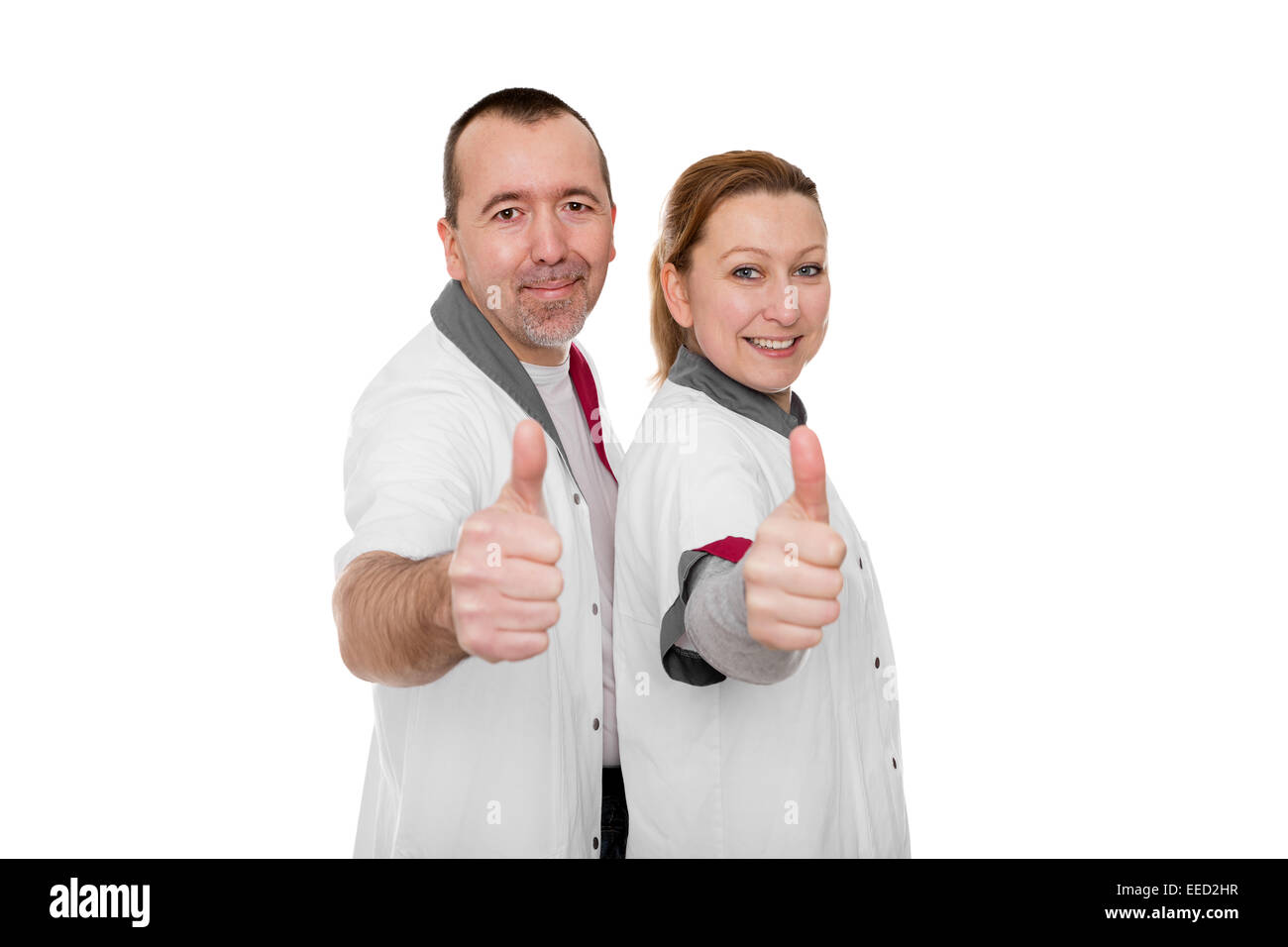 Le personnel infirmier montre l'énergie positive isolated on white Banque D'Images