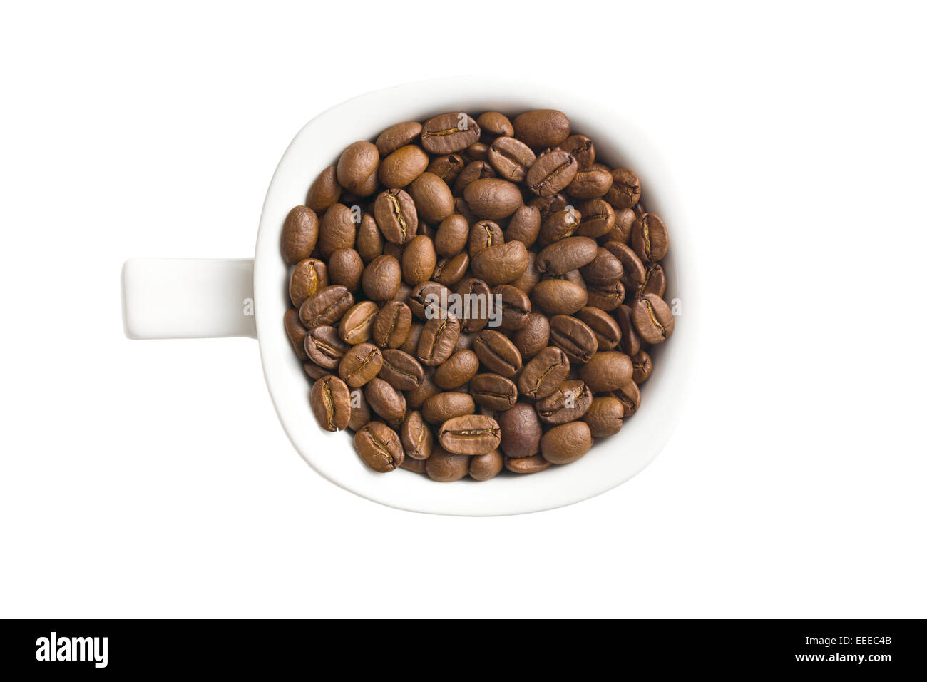 Vue de dessus de grains de café dans une tasse Banque D'Images