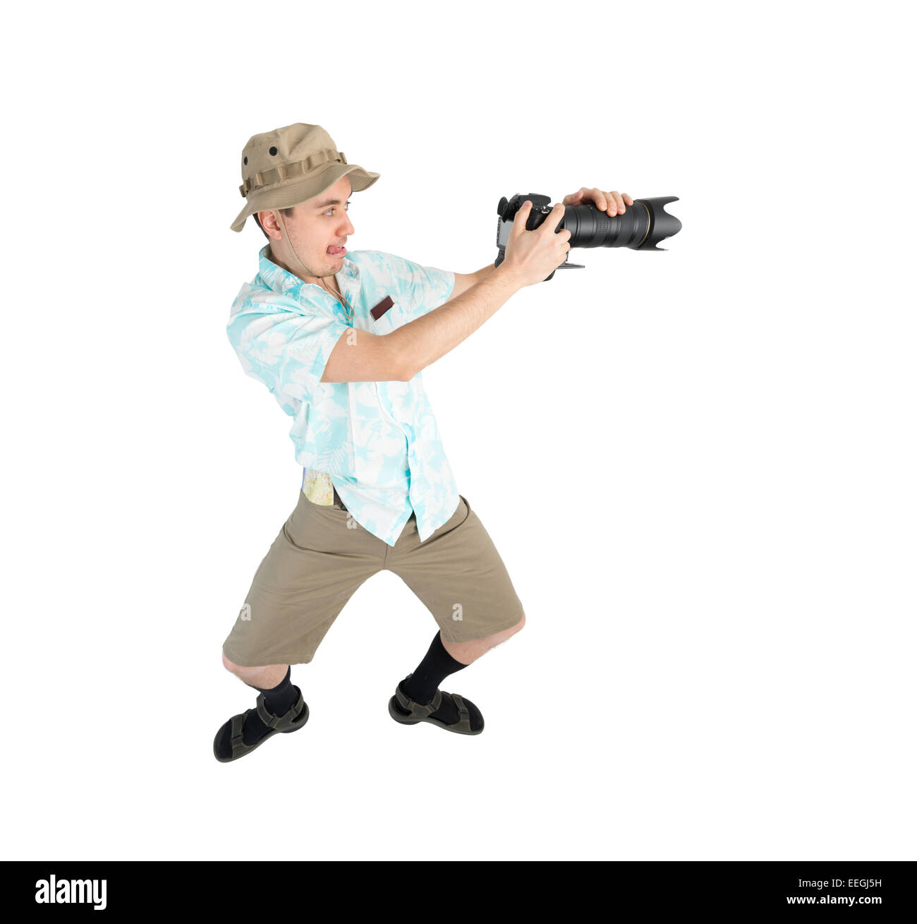 L homme ridicule en maillot bleu short marron et hat holding big photo reflex numerique et le tir. Traveler se concentrer et faire pi Photo Stock Alamy