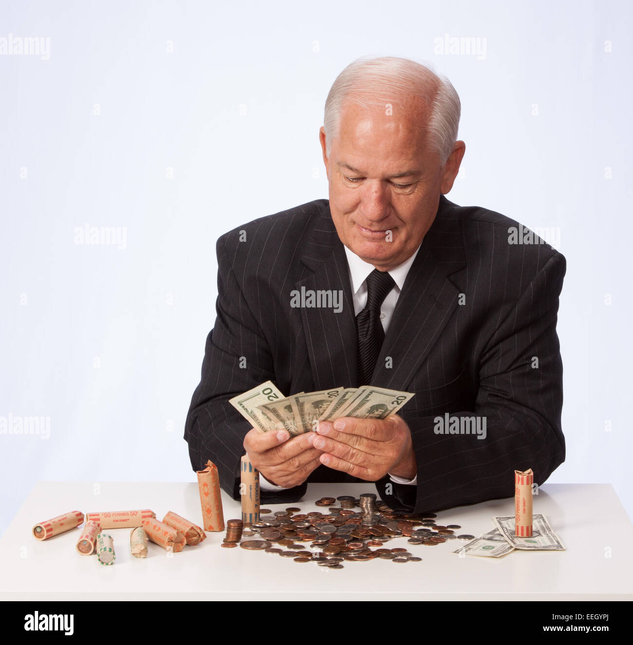 Man in suit compte devise USD Banque D'Images