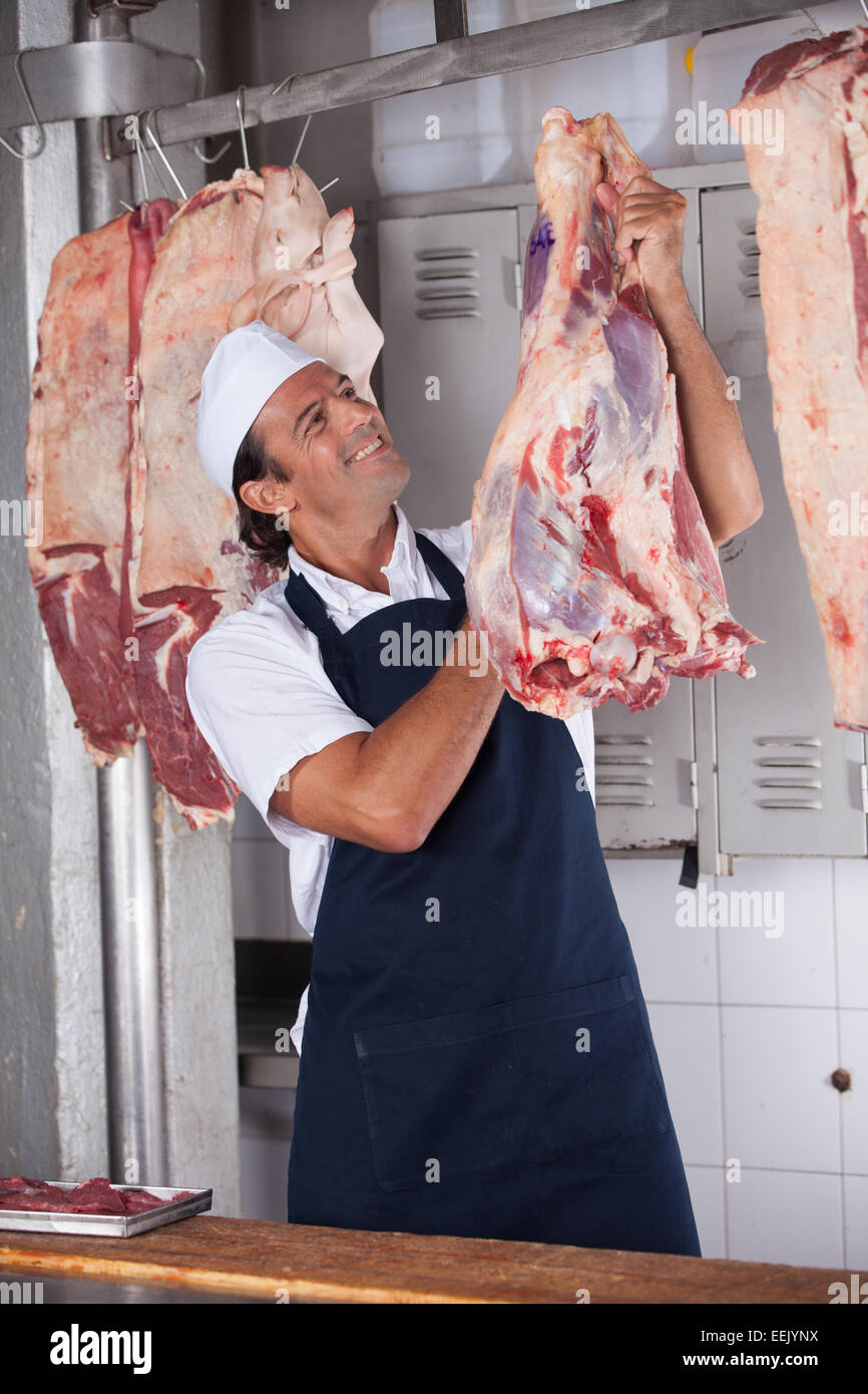 À la boucherie à stamp sur la viande Banque D'Images