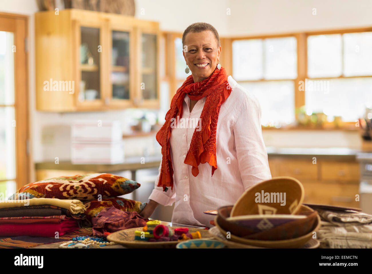 Plus mixed race woman smiling in office Banque D'Images