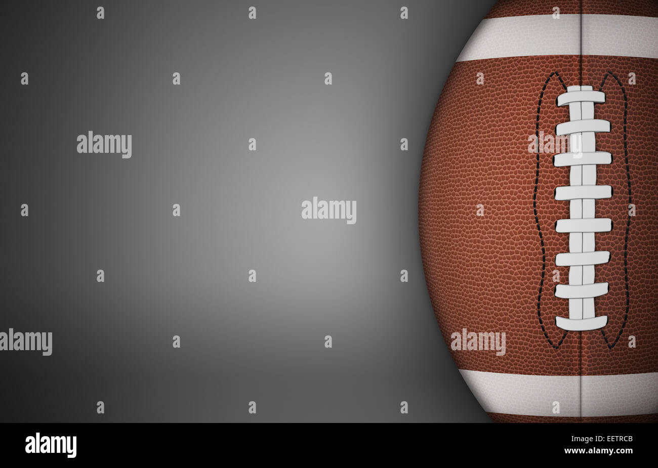 Ballon de football américain sur fond gris. avec beaucoup d'espace de copie. Banque D'Images