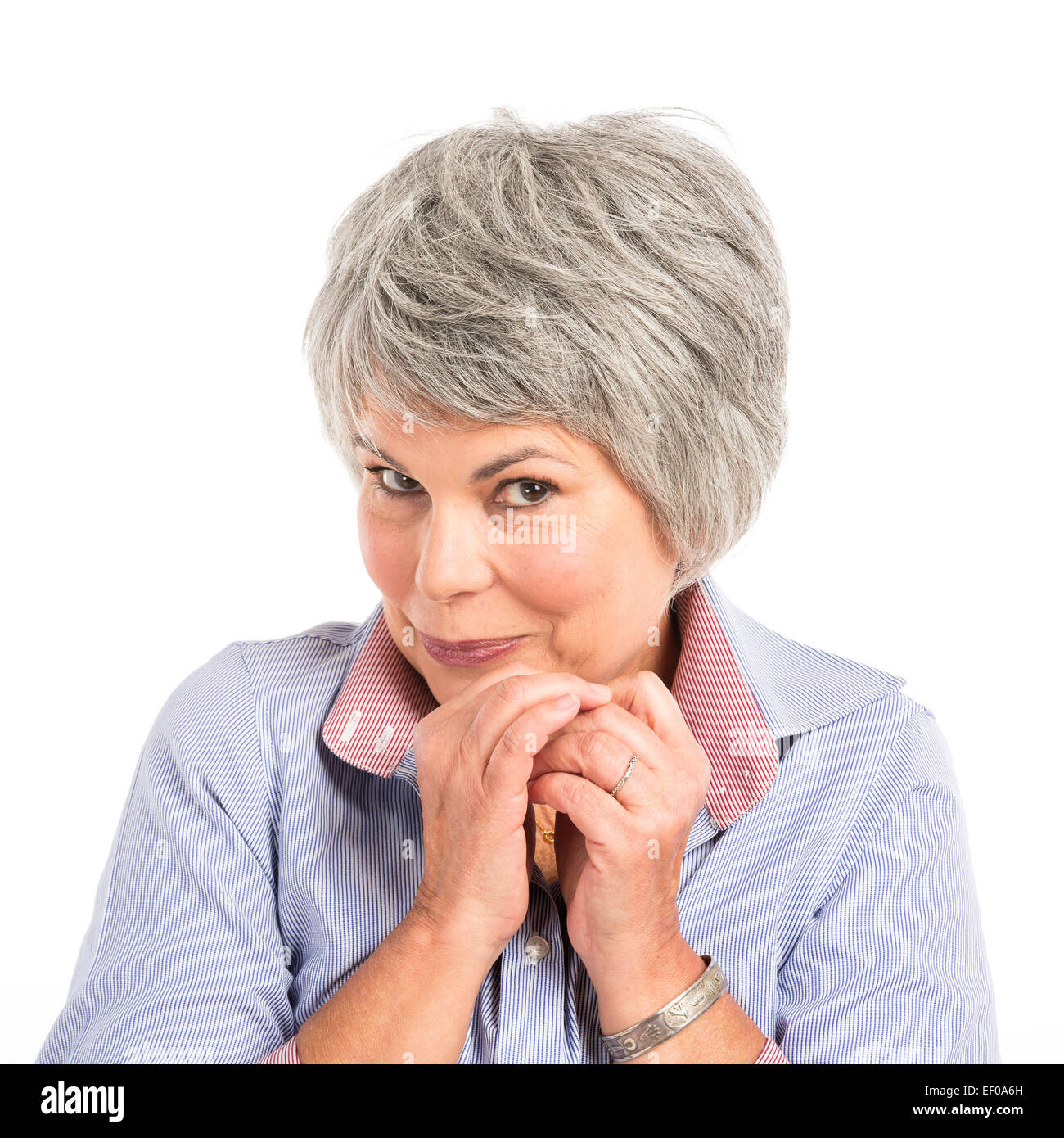 Portrait d'une femme âgée avec une expression timide Banque D'Images