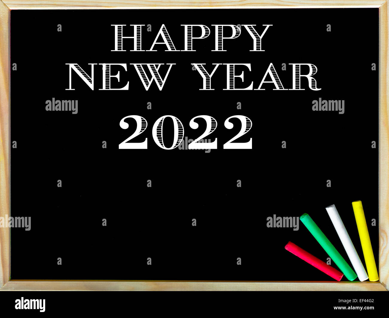 Bonne Année, la craie sur tableau noir vintage texte craie de couleur, dans le coin, Nouvelle ans conceptual image Banque D'Images