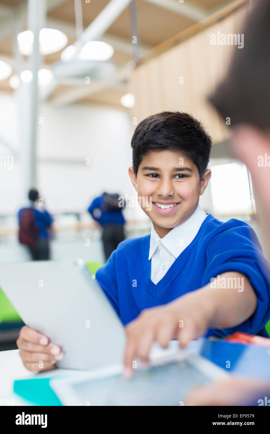 Elementary School boy with digital tablet Banque D'Images