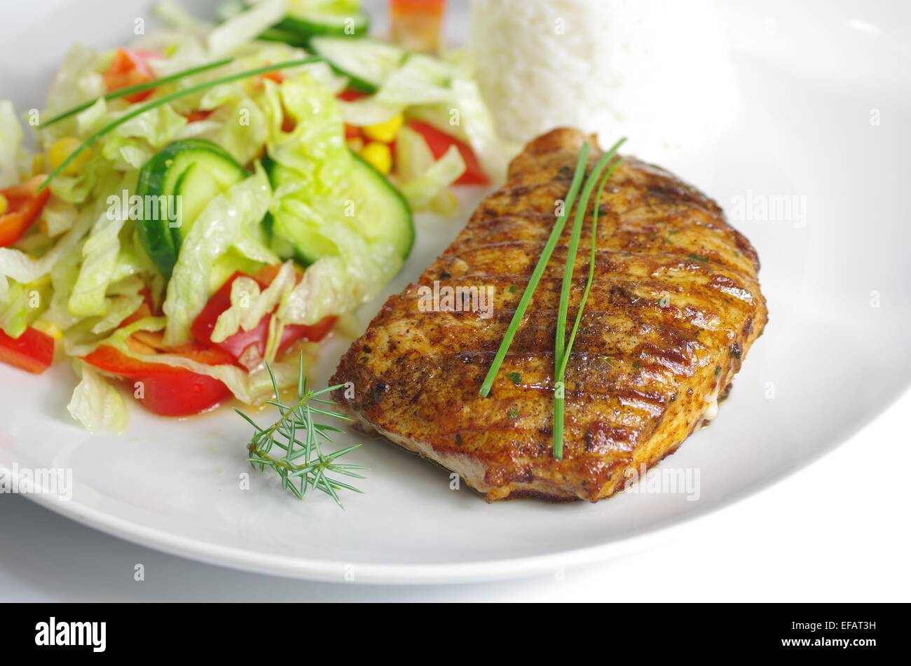 Steak avec du riz et légumes Banque D'Images