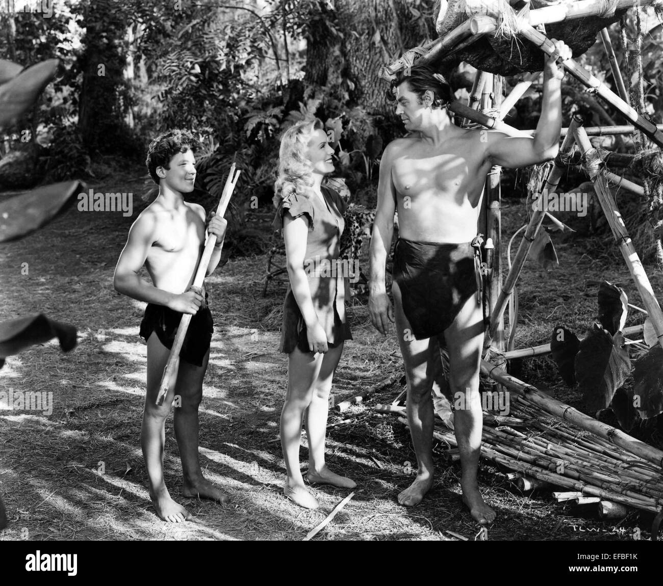 JOHNNY SHEFFIELD, BRENDA JOYCE, Johnny Weissmuller, TARZAN ET LA FEMME LÉOPARD, 1946 Banque D'Images