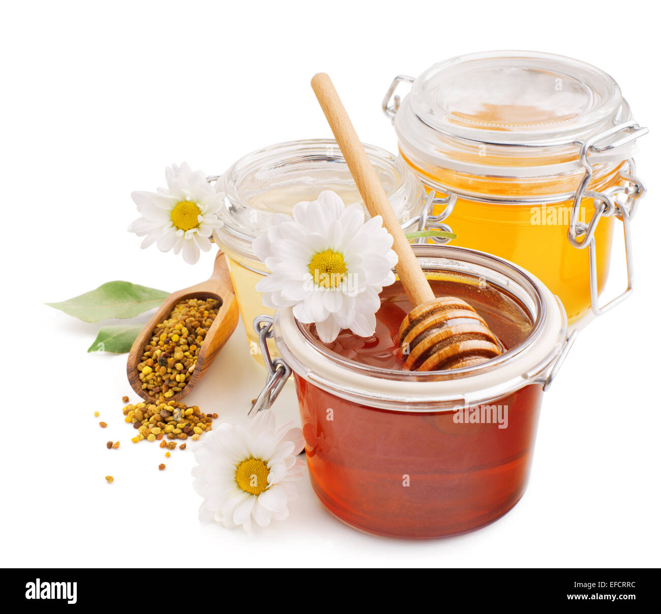 Nature morte avec du miel, des fleurs et du pollen Banque D'Images