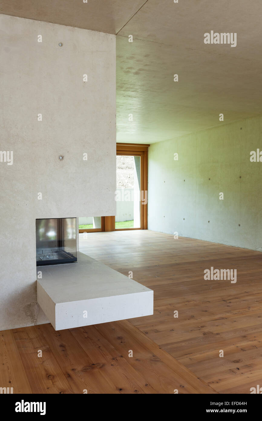 Nouvel appartement dans le ciment et le bois,avec cheminée Banque D'Images