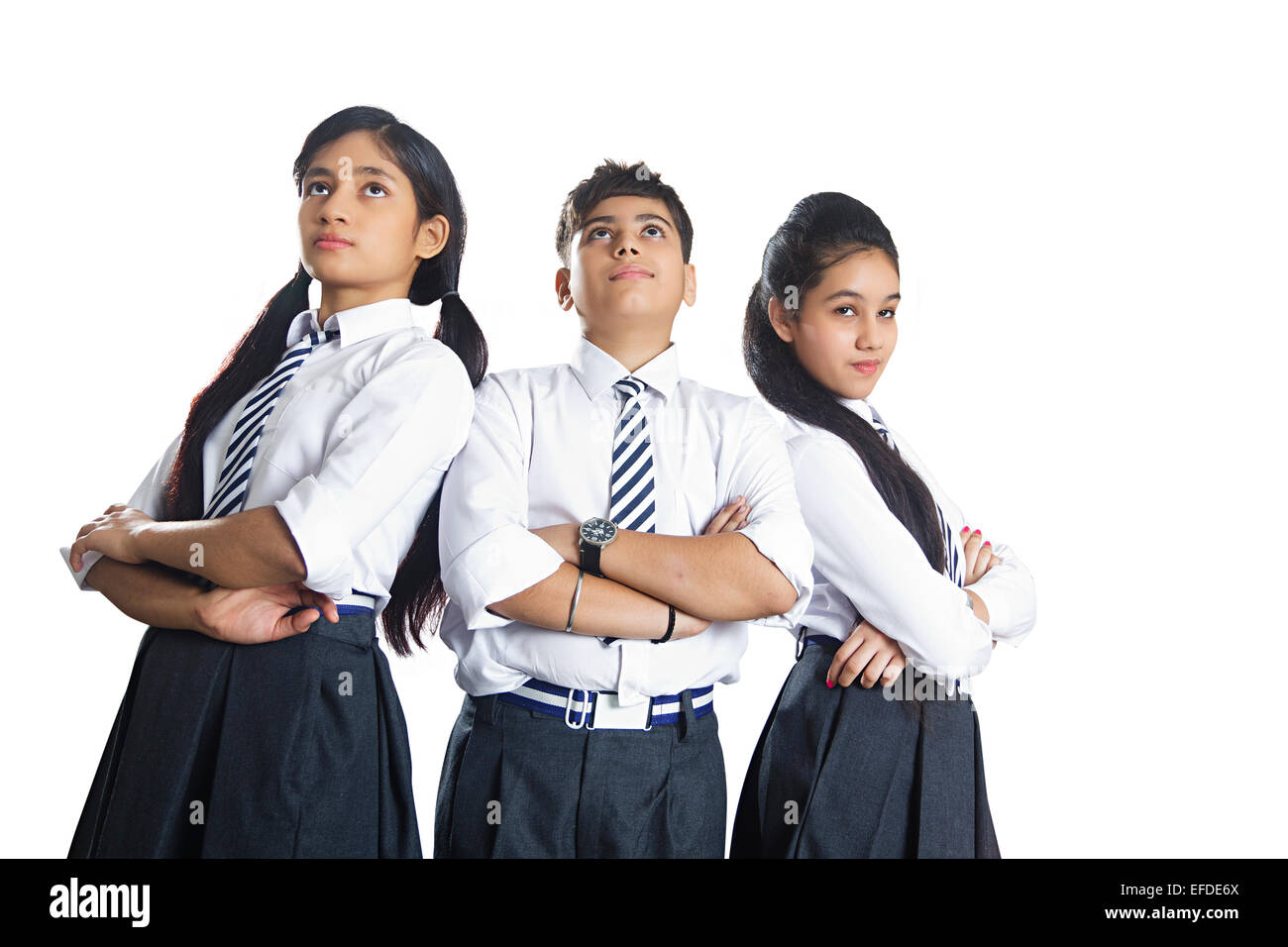 3 Indian school students standing Amis posent Banque D'Images