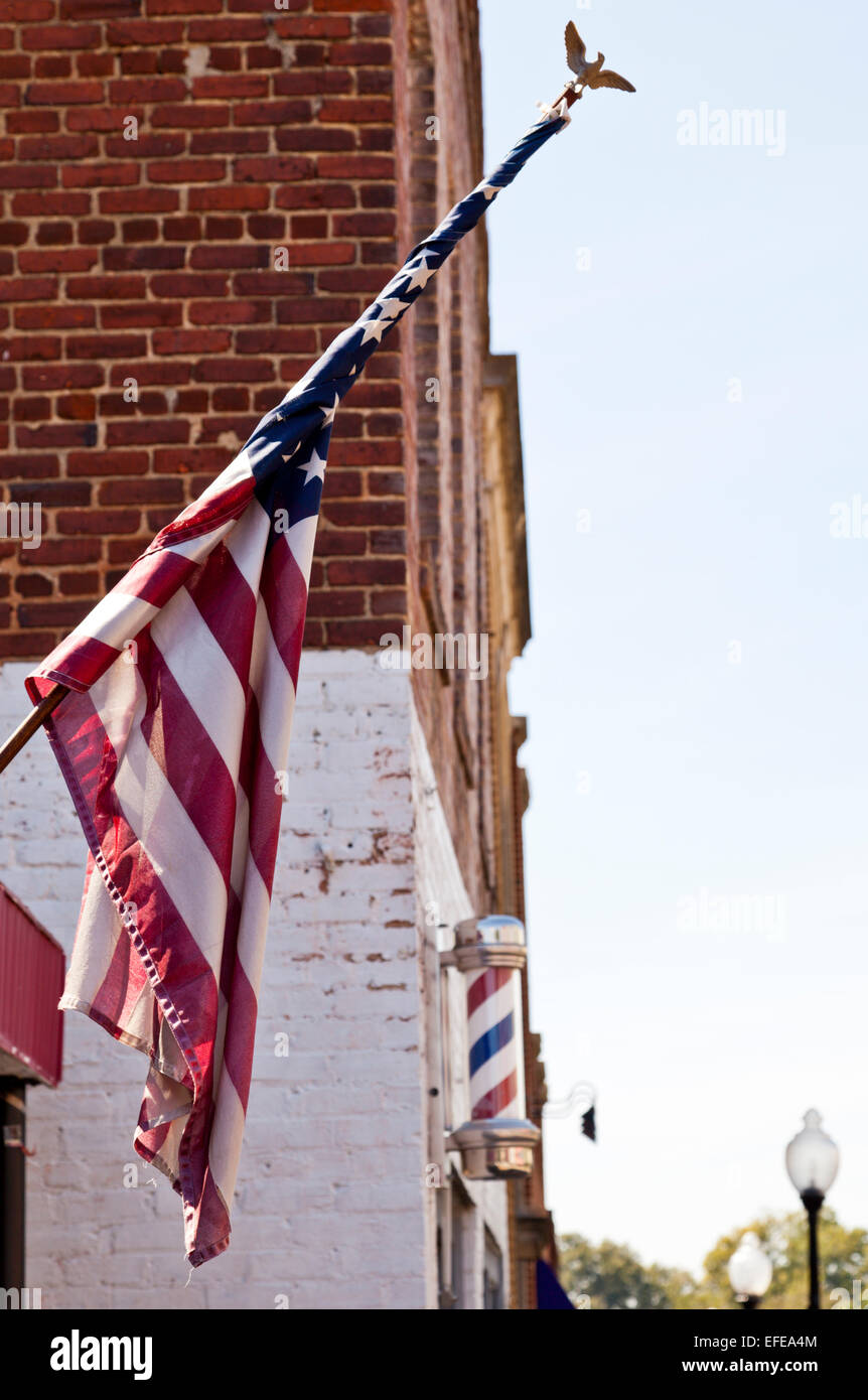 Stars and Stripes et un idéal féminin sur un magasin à Fort Mill en Caroline du Sud États-Unis d'Amérique USA Banque D'Images
