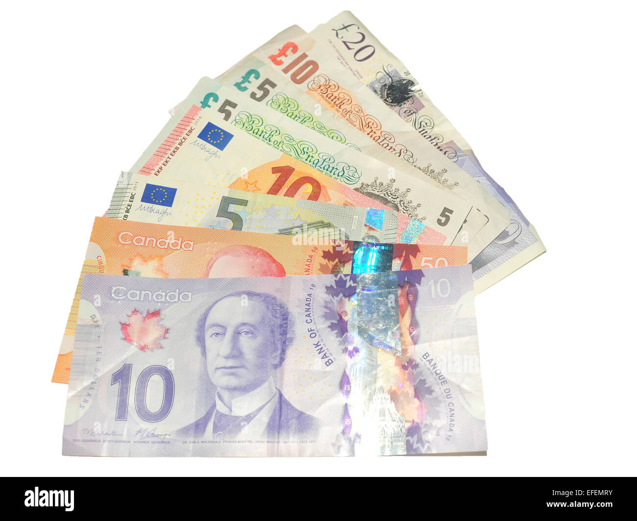 La livre sterling, dollar canadien notes et notes notes Euro européenne photographié sur un fond blanc. Banque D'Images