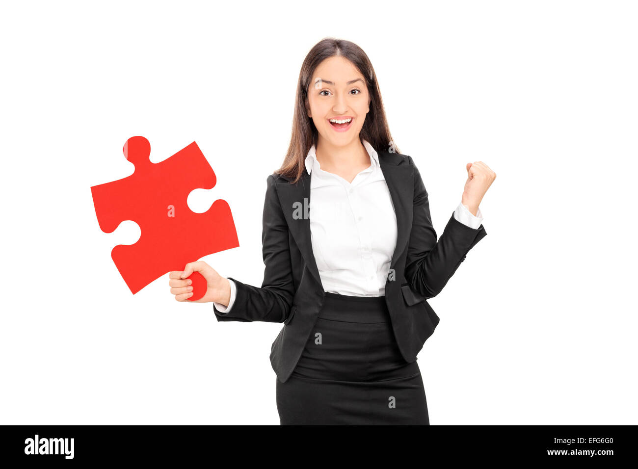 Ravi businesswoman holding un morceau de puzzle isolé sur fond blanc Banque D'Images