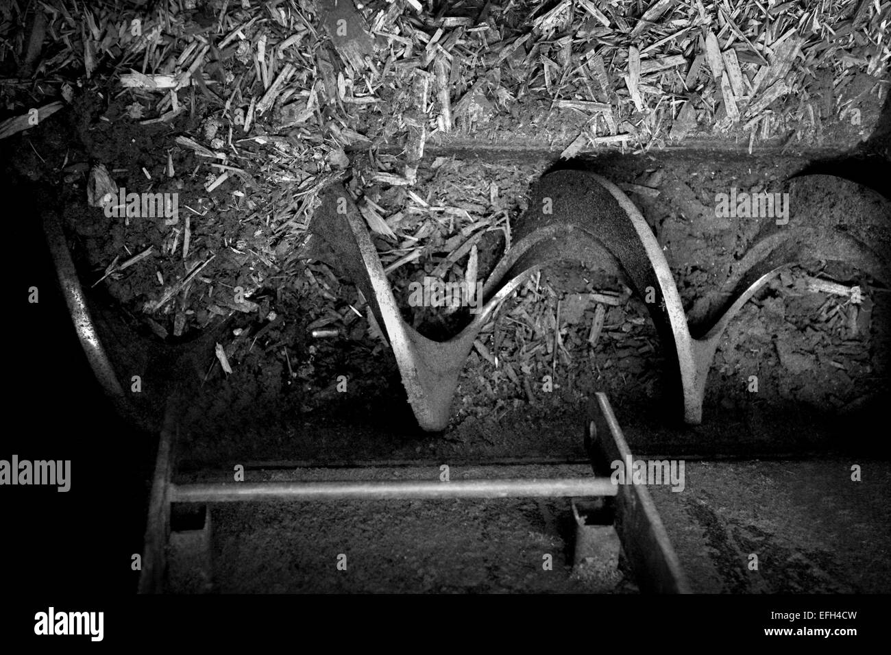 Détail de l'engrenage de la machine industrielle dans les composants de l'usine de biomasse, noir & blanc, Close up Banque D'Images