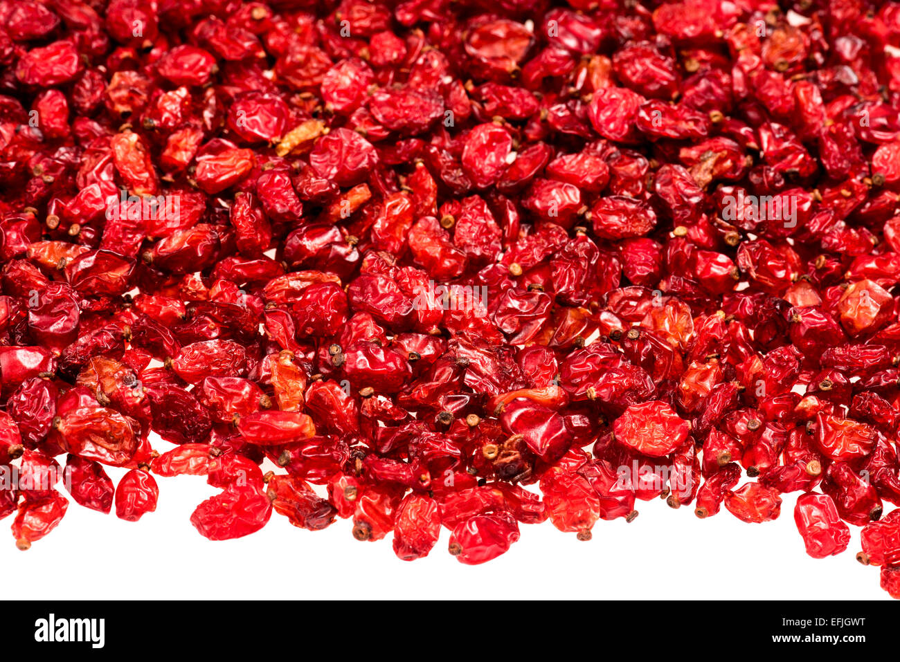 Berberis vulgaris berries red sweet sour la cuisson la cuisson des aliments délicieux plateau fruits structures raisins secs sans découpe sur wh Banque D'Images