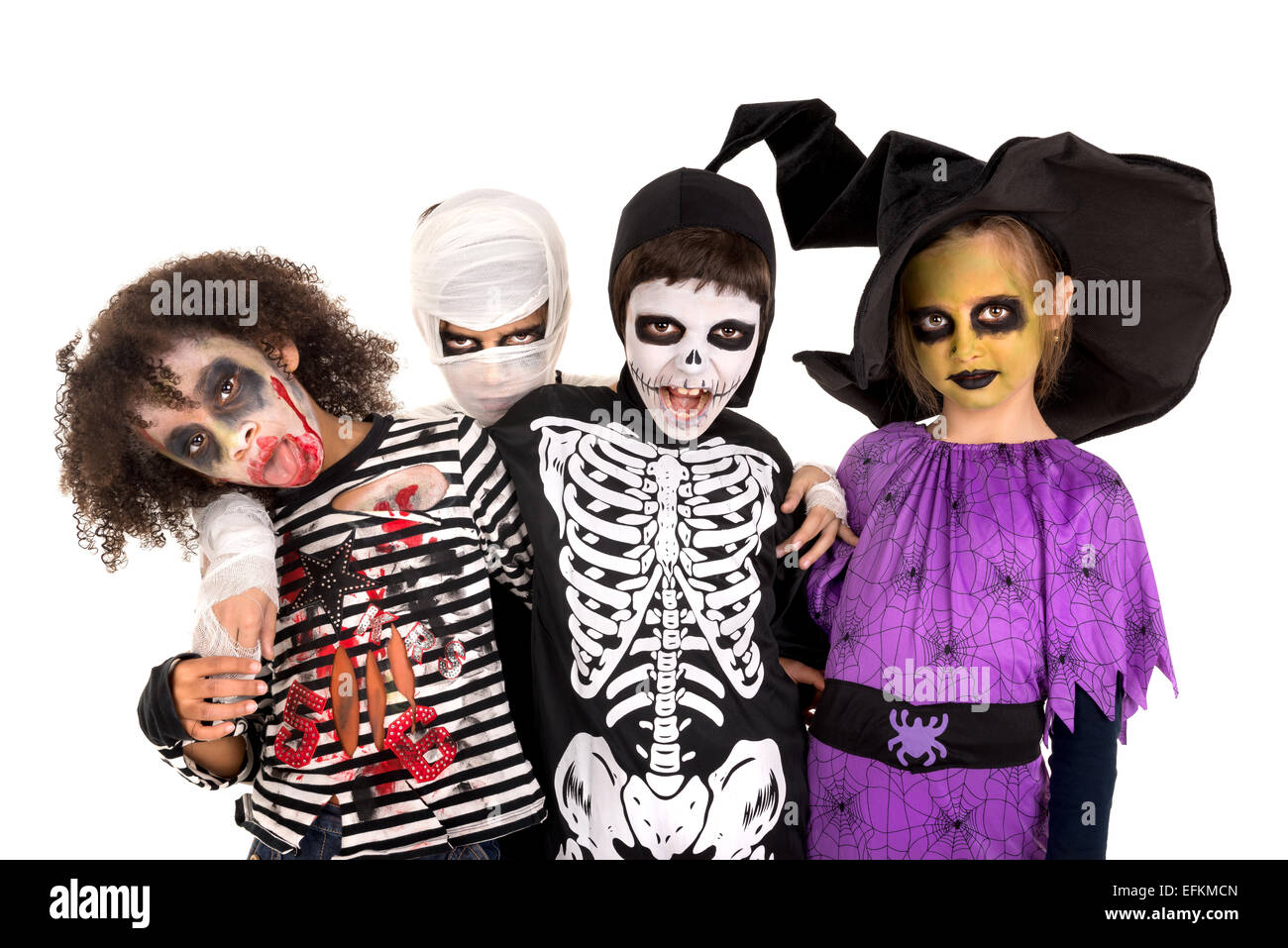 Les enfants face à la peinture et les costumes de Halloween isolé dans White Banque D'Images