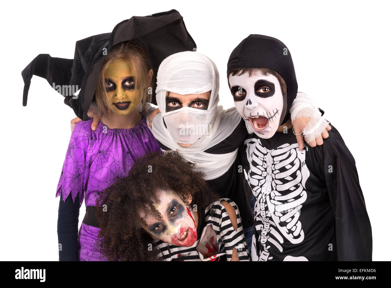 Les enfants face à la peinture et les costumes de Halloween isolé dans White Banque D'Images