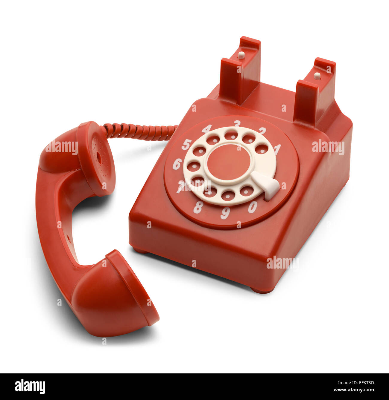 Téléphone à cadran rouge et blanc hors du crochet isolé sur fond blanc. Banque D'Images