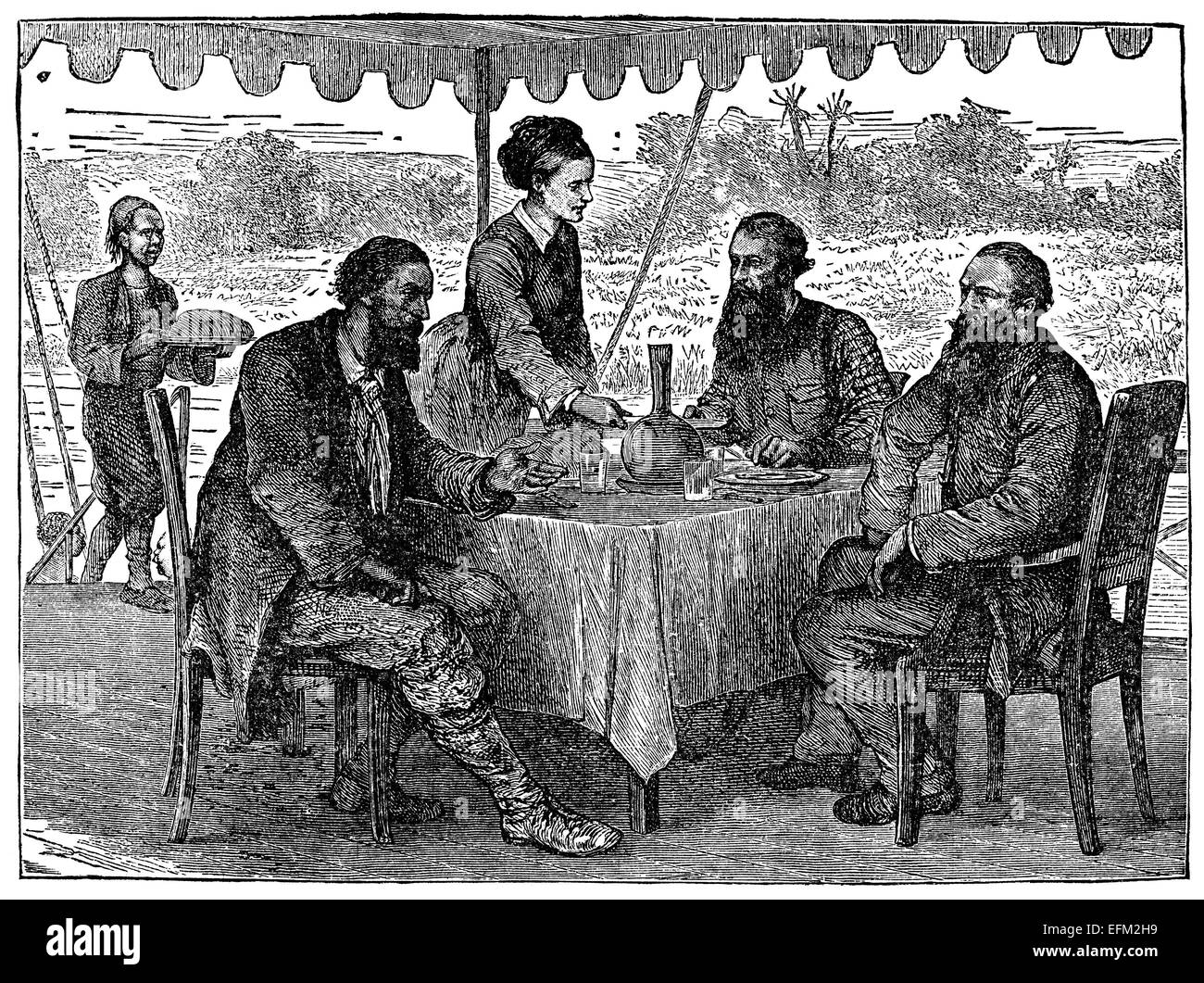 Gravure du xixe siècle des hommes et des femmes d'une salle à manger sous une tente en Afrique Banque D'Images