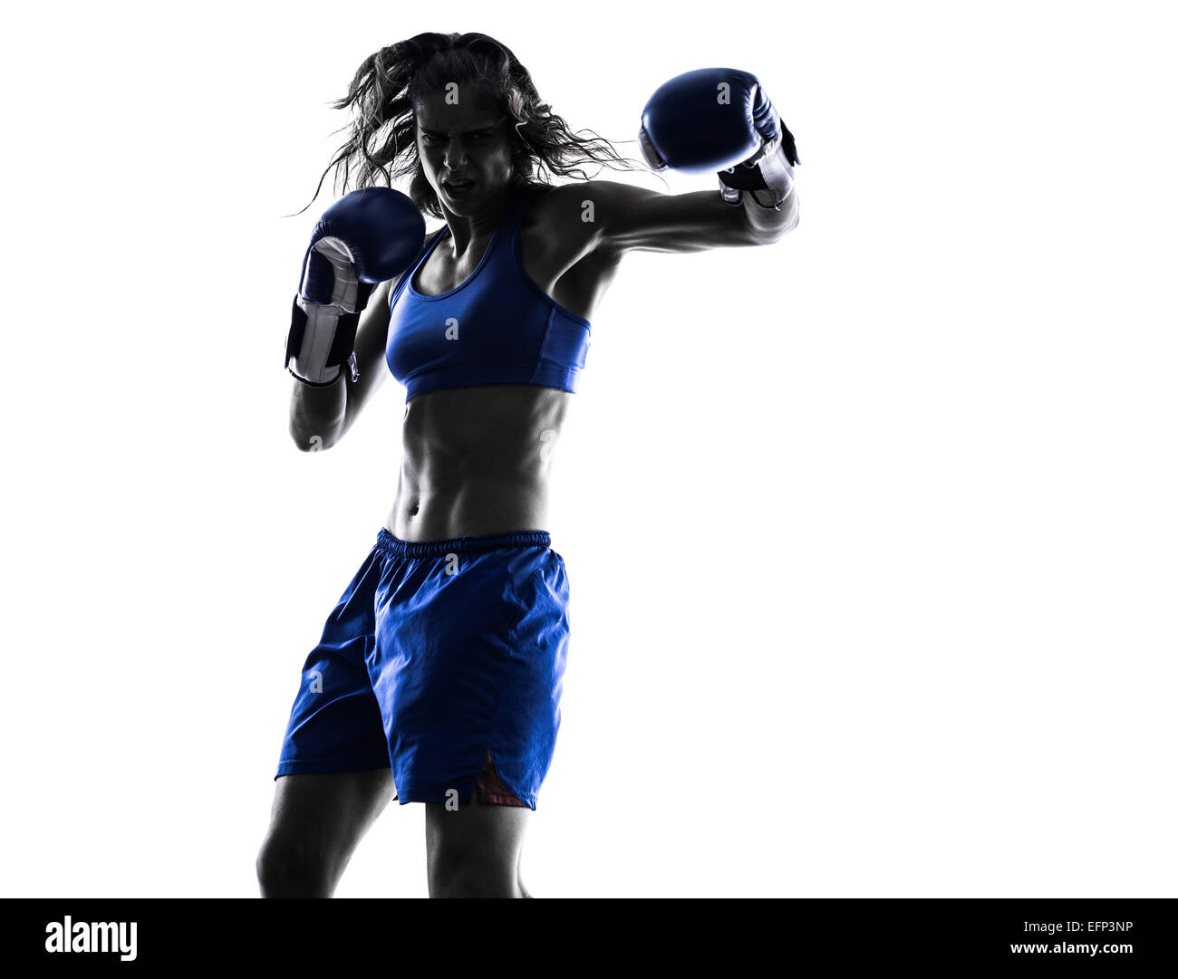 Une femme de kickboxing boxe boxeur en silhouette isolé sur fond blanc Banque D'Images