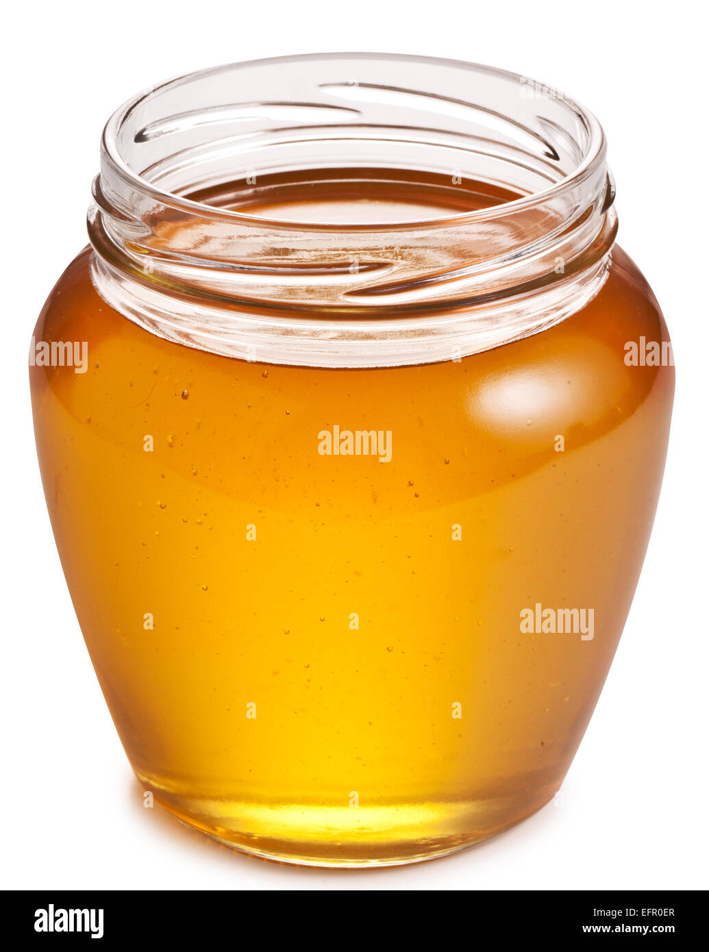Le verre peut ouvrir plein de miel. Chemins de détourage. Banque D'Images
