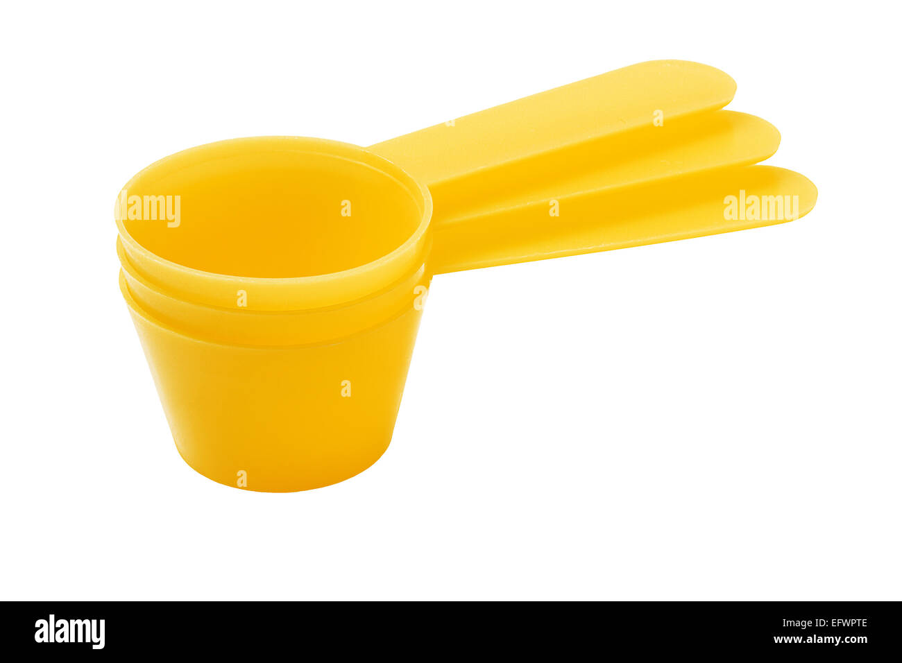 Trois cuillères de poudre de lait en plastique sur fond blanc Banque D'Images
