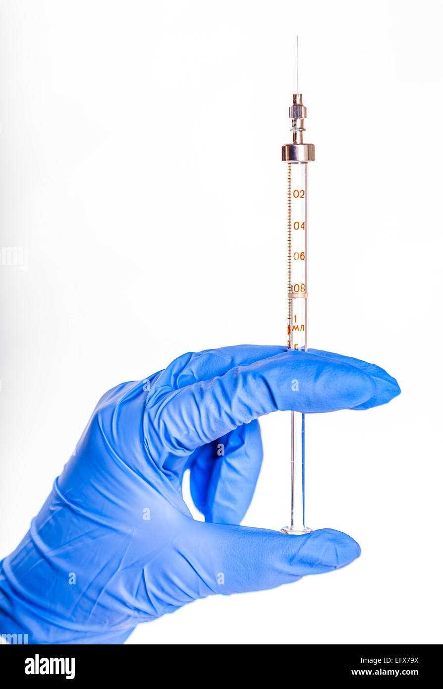 La seringue d'injection médicale soins de santé médecine gant vaccination grippe bleu aiguille chirurgicale médecin de l'hôpital Banque D'Images