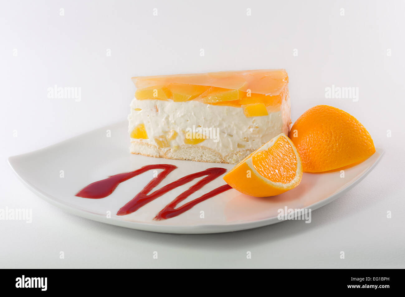 Gateau Aux Fruits Orange Mandarine Decoration Taille De Portion Plate Fromage Desert Repas Une Partie De La Gelatine Tarte Cocktail Dessert Cheesecake Torte Photo Stock Alamy