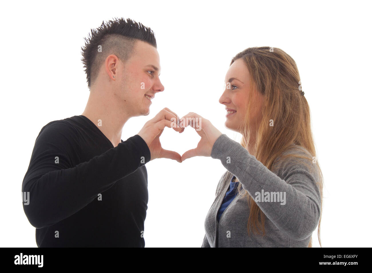 Garçon et fille tomber en amour isolated over white Banque D'Images