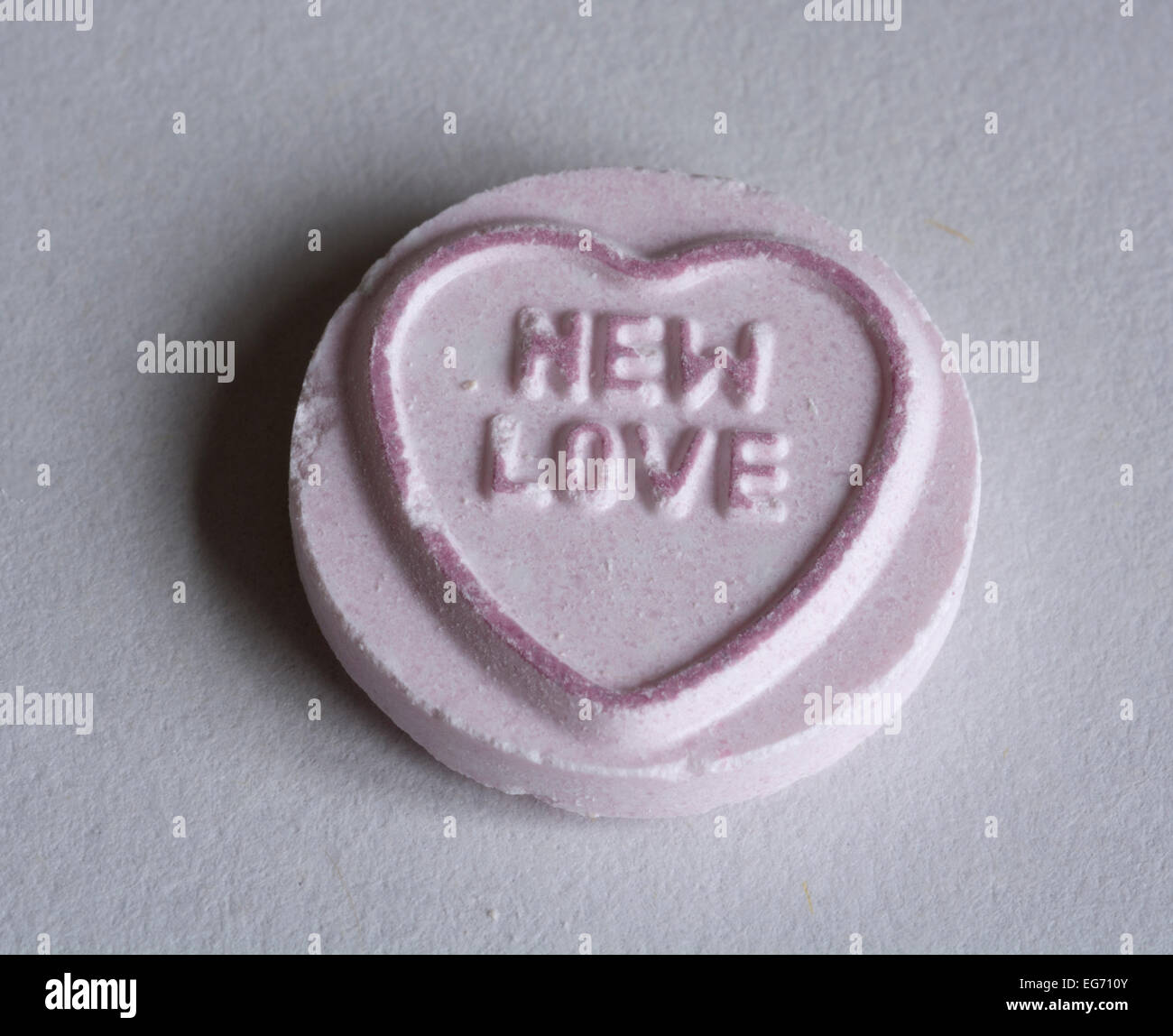 Un amour coeur doux avec le message 'New love'. Banque D'Images