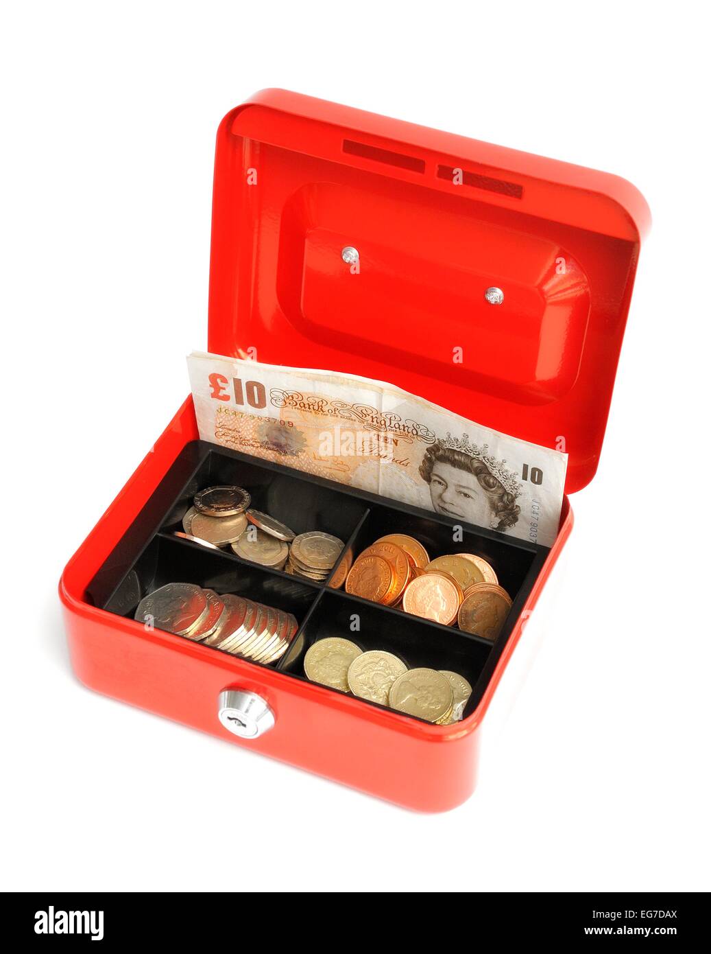 Une petite caisse rouge tin avec un flotteur d'argent à l'intérieur Banque D'Images