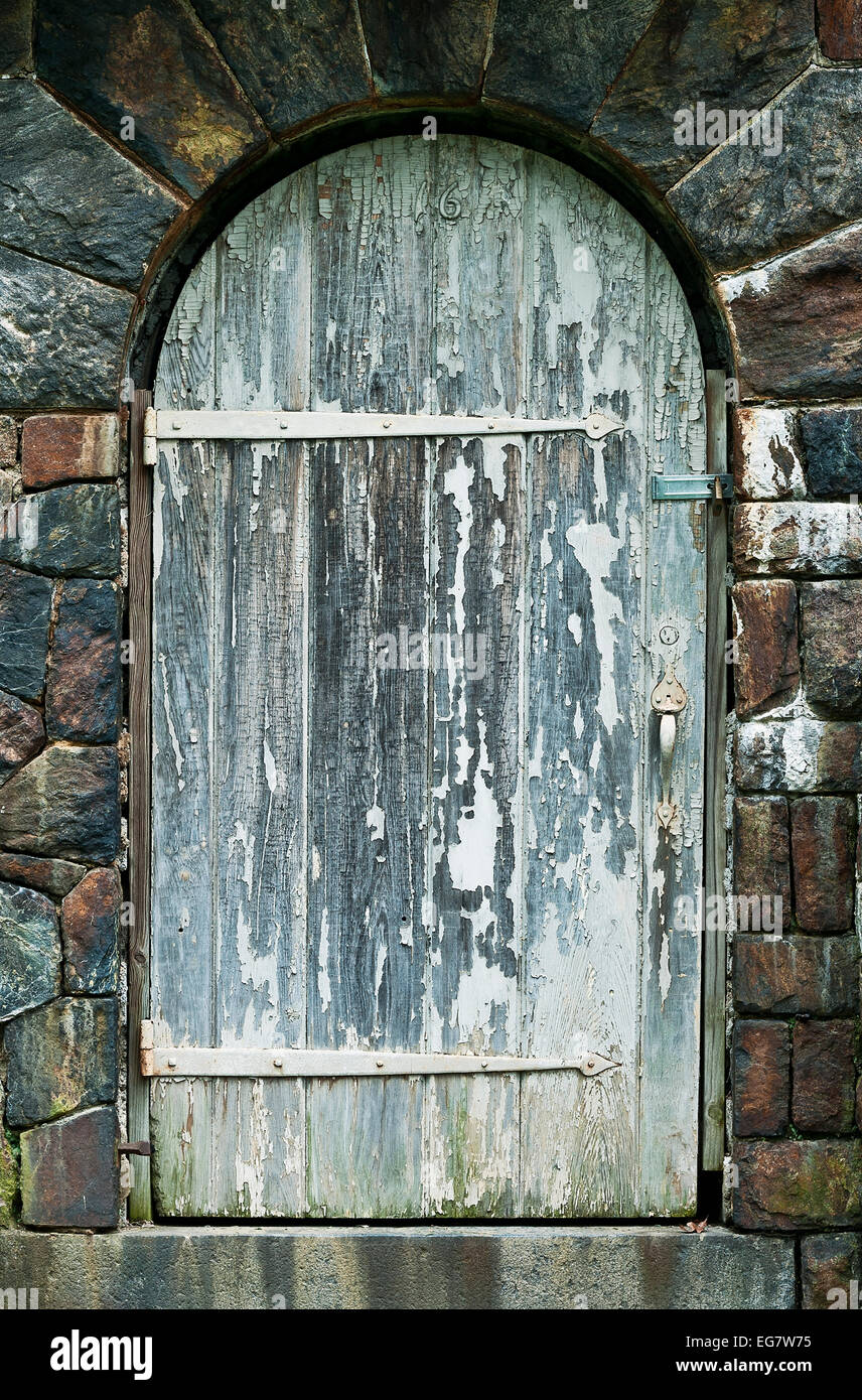 Vieille porte en bois cintrées. Banque D'Images