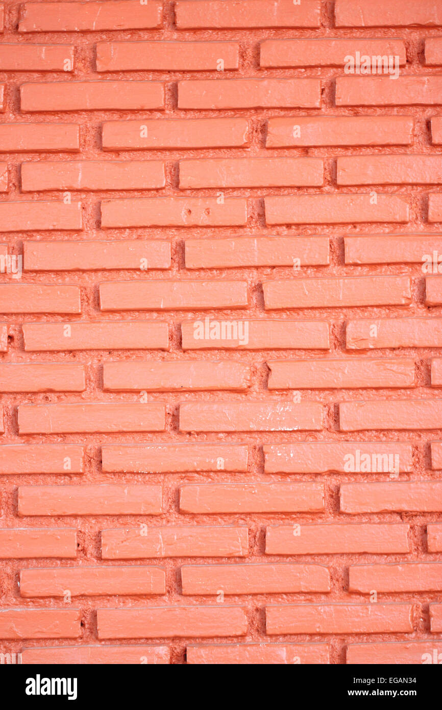 Mur de brique brun foncé pour un arrière-plan. Banque D'Images