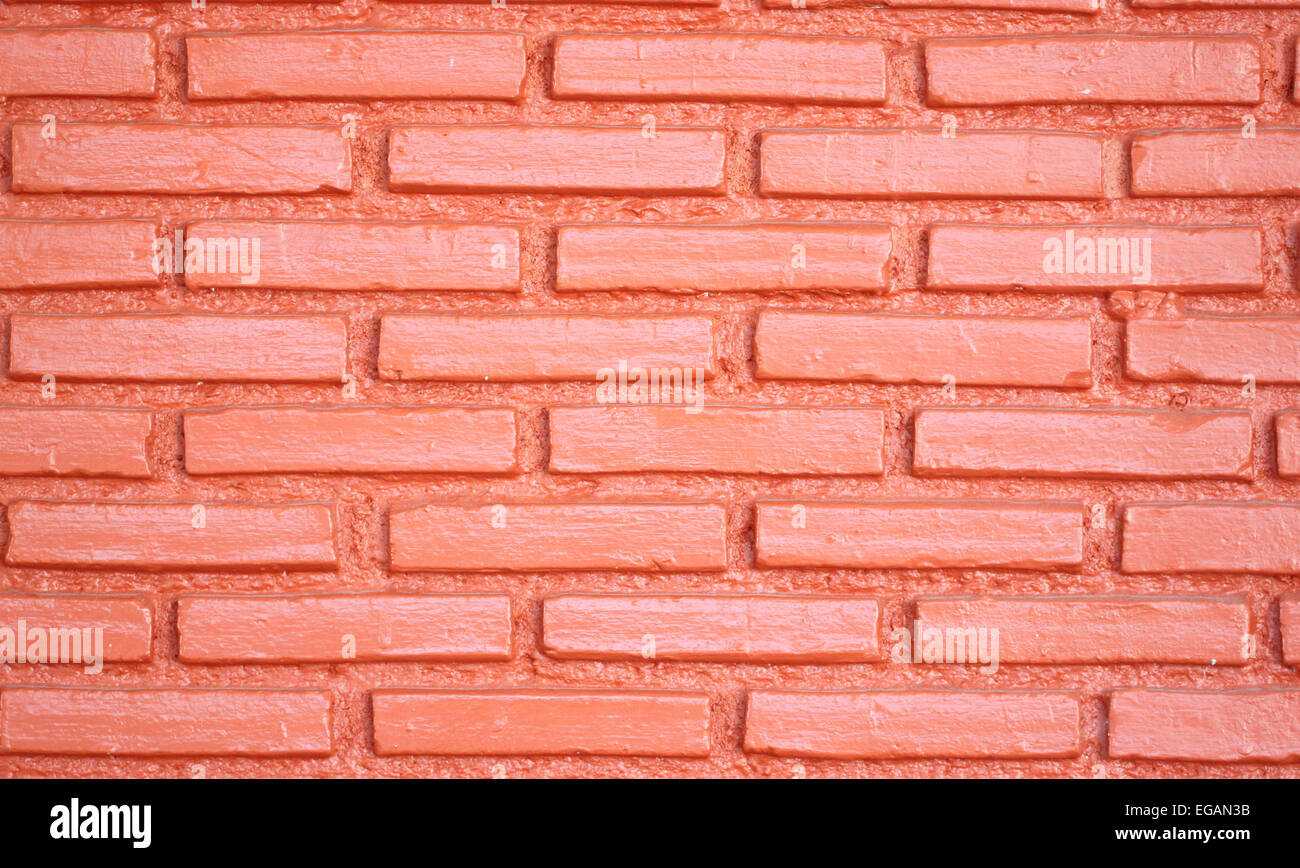 Mur de brique brun foncé pour un arrière-plan. Banque D'Images