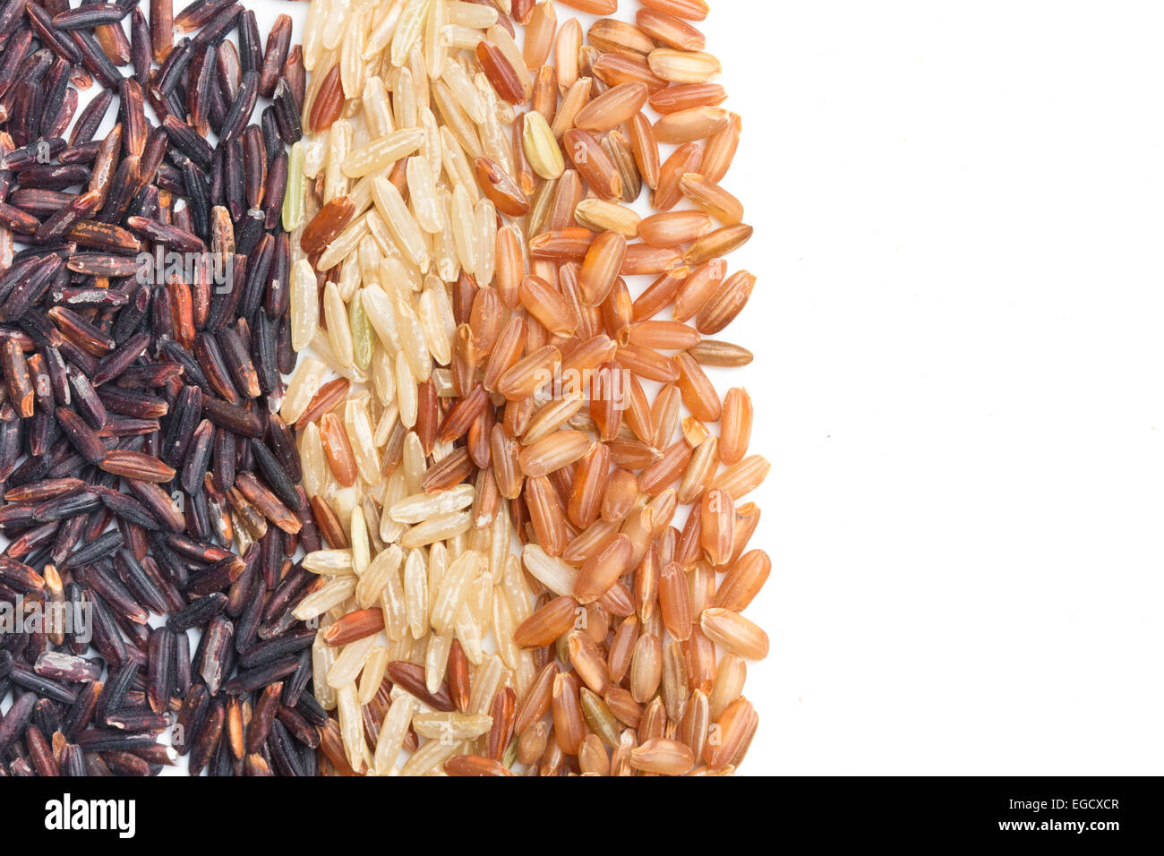 Trois types de variétés de riz brun, noir, jaune et marron avec copie espace Banque D'Images