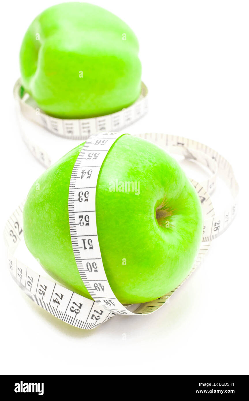Concept de régime . Vie saine - nutrition et l'exercice, apple et la mesure. Banque D'Images