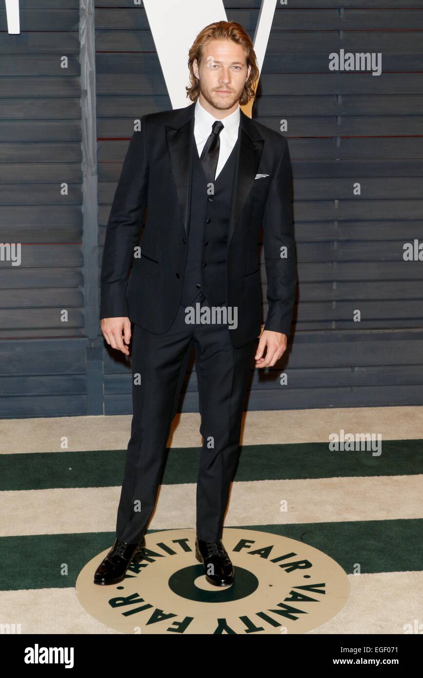 Acteur Luke Bracey assiste à la Vanity Fair Oscar Party à Wallis Annenberg Center for the Performing Arts à Beverly Hills, Los Angeles, USA, le 22 février 2015. Photo : Hubert Boesl /dpa - PAS DE FIL - SERVICE Banque D'Images