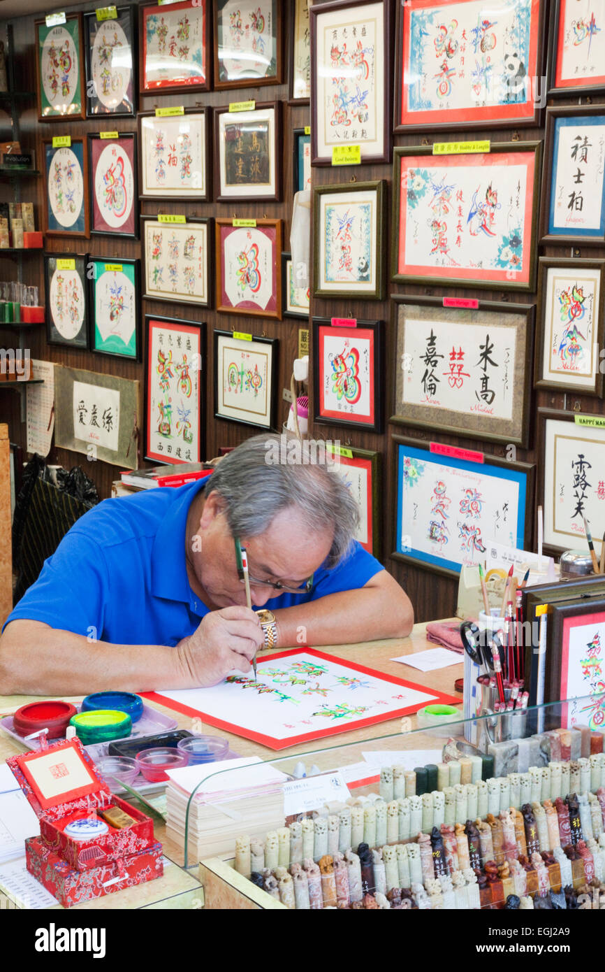 La Chine, de Hong Kong, Stanley Market, artiste de calligraphie Banque D'Images