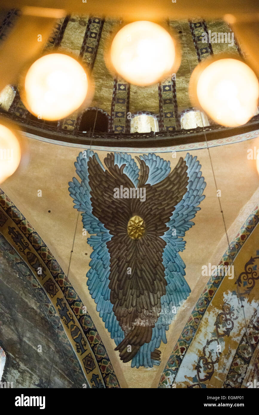Sainte-Sophie Seraphim Angel figure Istanbul // ISTANBUL, Turquie — figure peinte de séraphins (ange) dans la Sainte-Sophie, découverte lors de travaux de restauration en 2009. La figure était restée cachée sous le plâtre pendant des siècles pendant l'utilisation du bâtiment comme mosquée. Ce séraphin représente l'un des nombreux anges qui ornaient autrefois les galeries supérieures de la structure. Banque D'Images