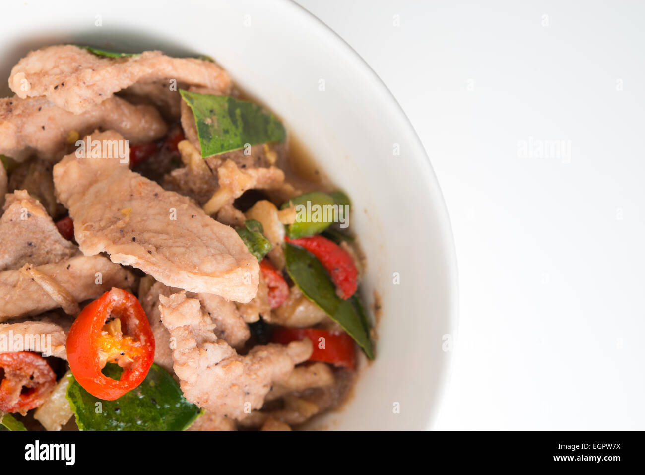 Porc frit épicé avec pâte de crevettes Banque D'Images