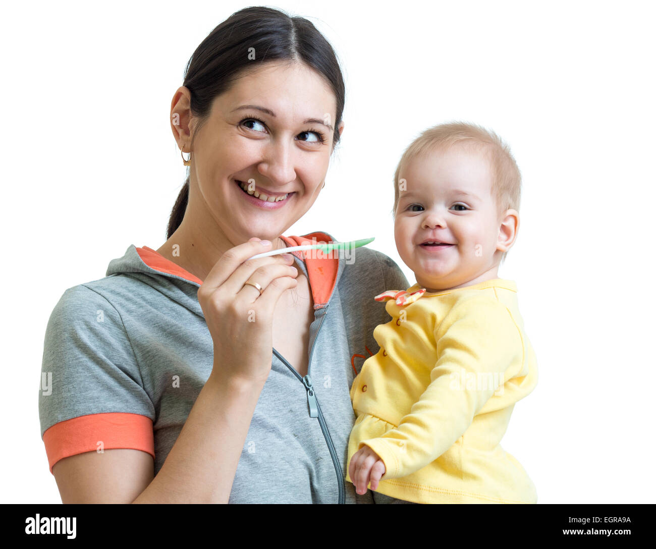 Peu pour nourrir bébé avec une cuillère Banque D'Images