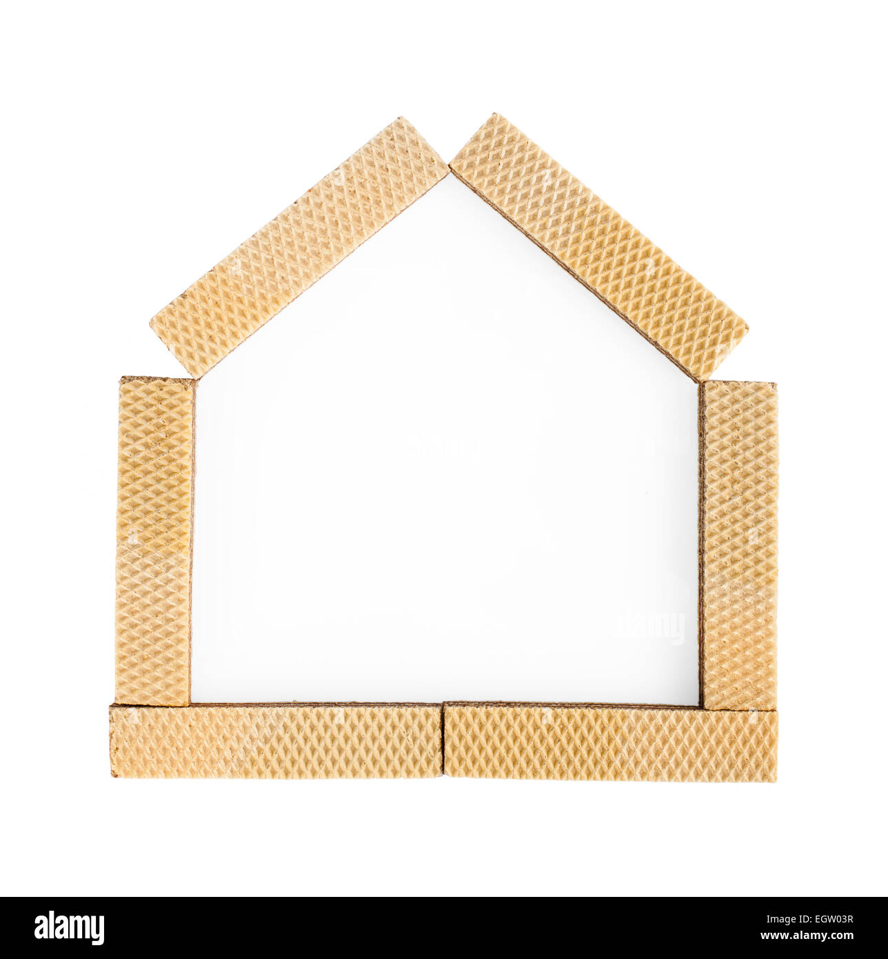 Métaphore du home sweet home avec gaufrettes sur fond blanc Banque D'Images