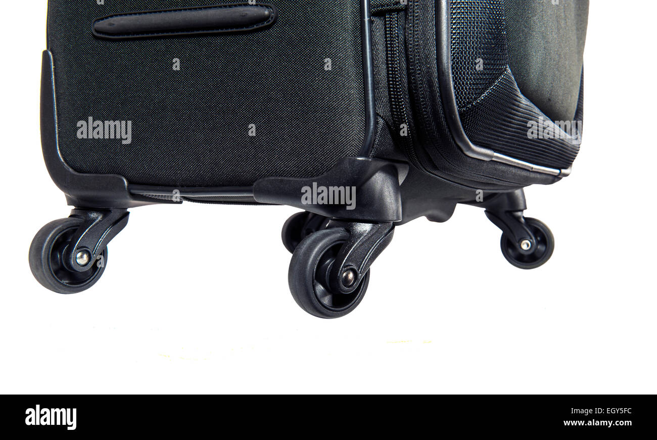 Close up des roues sur une valise à quatre roues Banque D'Images