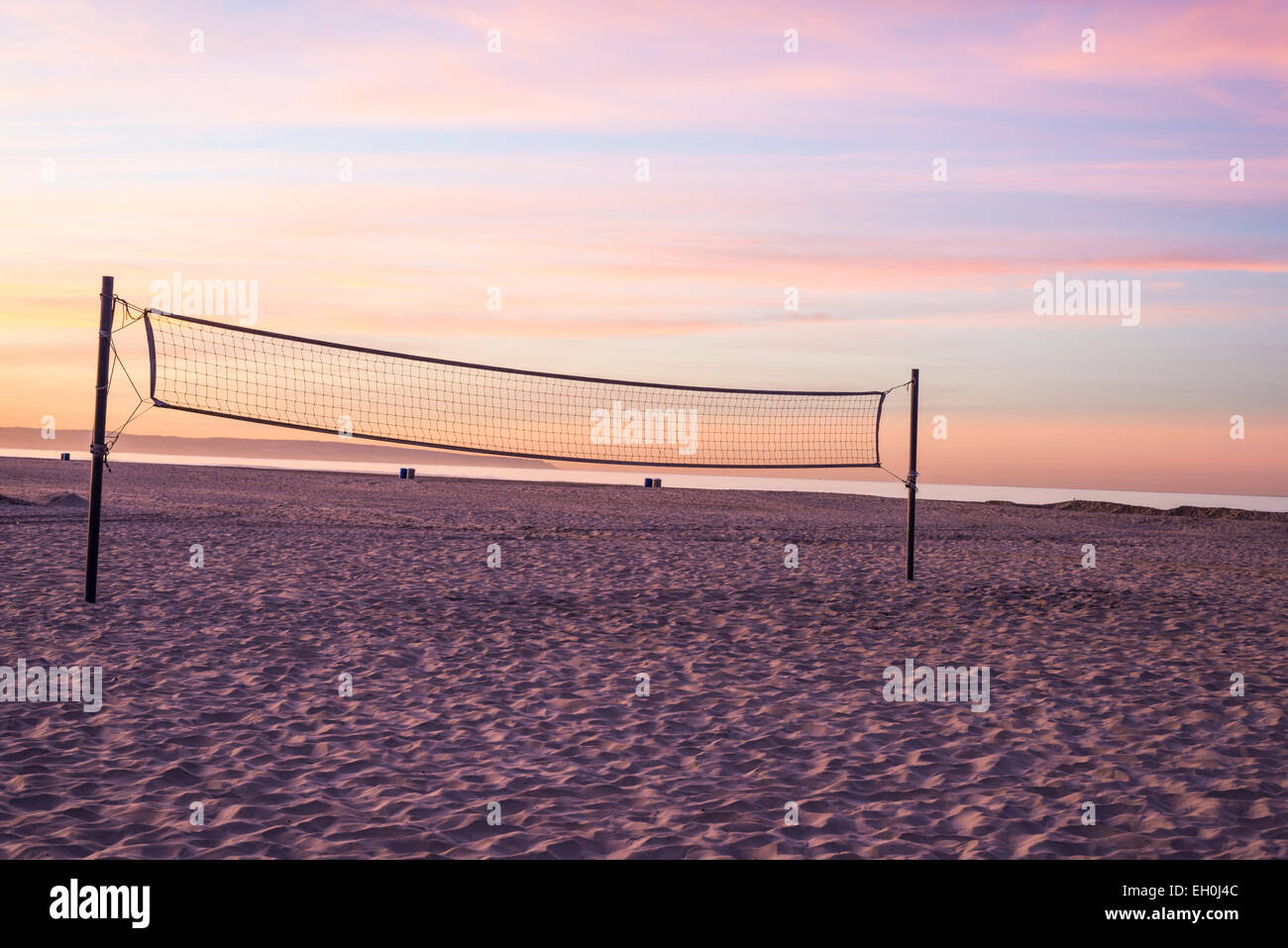 Filet de volley-ball de plage sur Coronado Beach Central pendant le lever du soleil. Coronado, en Californie, aux États-Unis. Banque D'Images