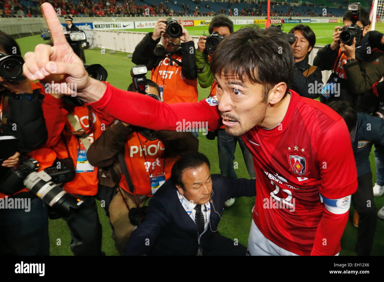 Saitama, Japon. 4e Mar, 2015. Yuki Abe (rouges) Football/soccer : Ligue des Champions de l'AFC 2015 match du groupe G entre Urawa Reds 0-1 Brisbane Roar FC à Saitama Stadium 2002 à Saitama, Japon . © Sho Tamura/AFLO SPORT/Alamy Live News Banque D'Images